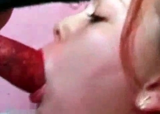 Doggy gets nicely sucked by a redhead hooker