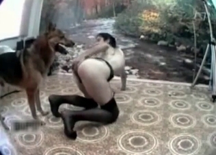 Naked bitch and her lovely trained dog